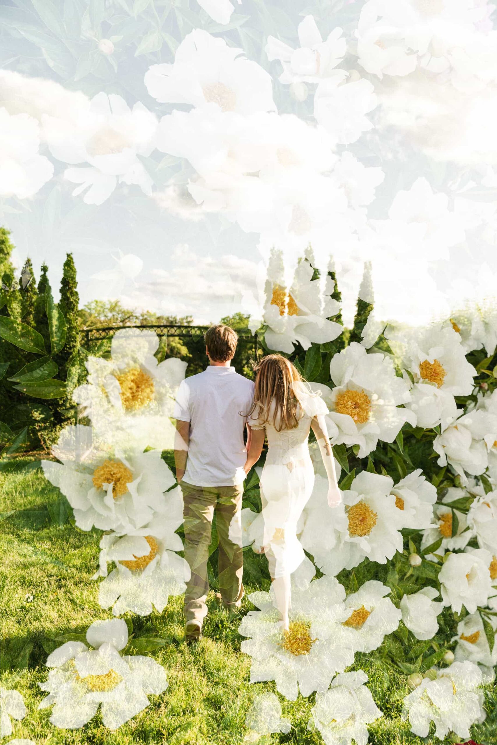 double exposure engagement photograph with spring florals overlayed to a couple candidly walking